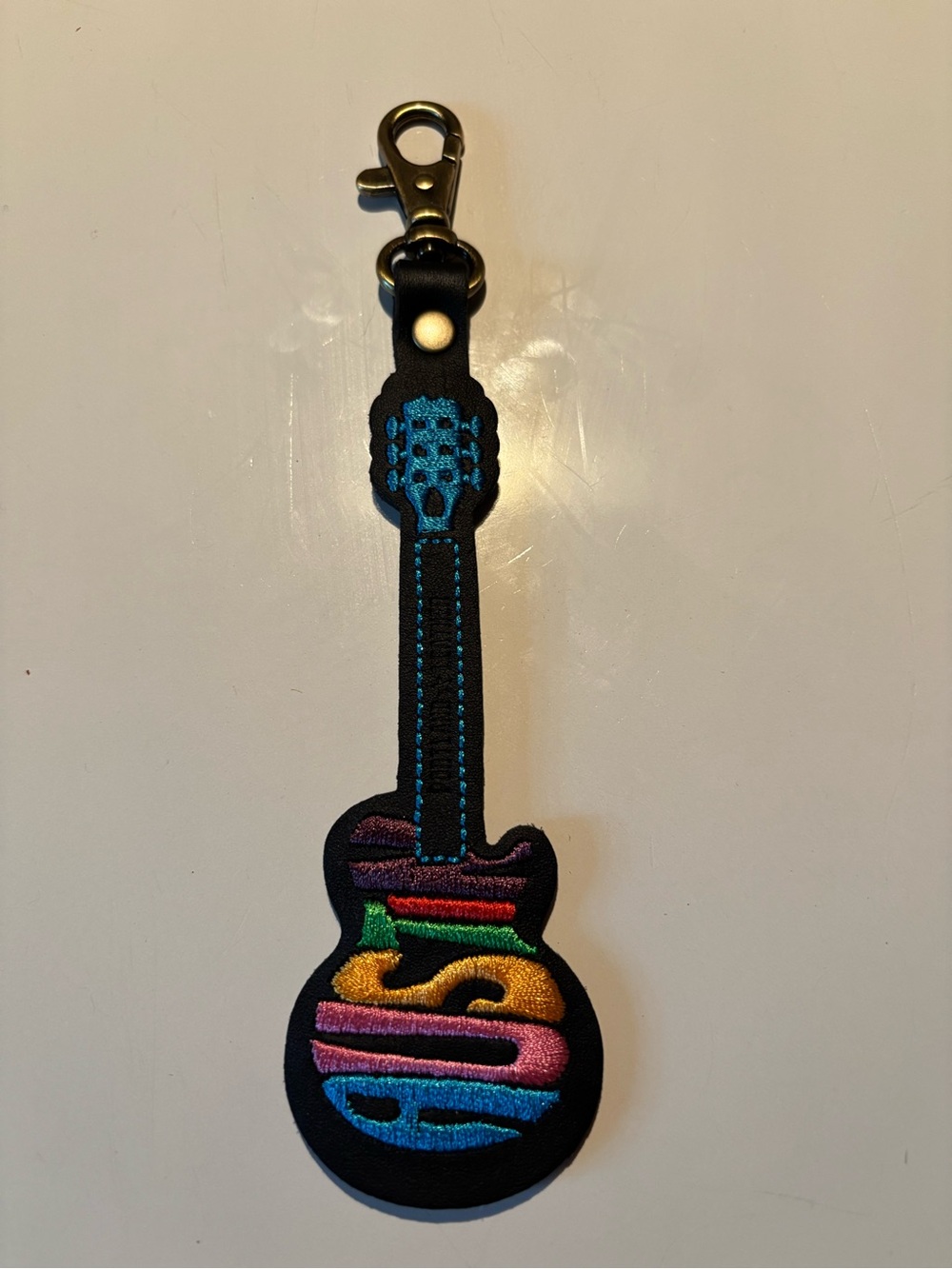 Portland Leather Black Guitar Charm with Rainbow Embroidered Stripes